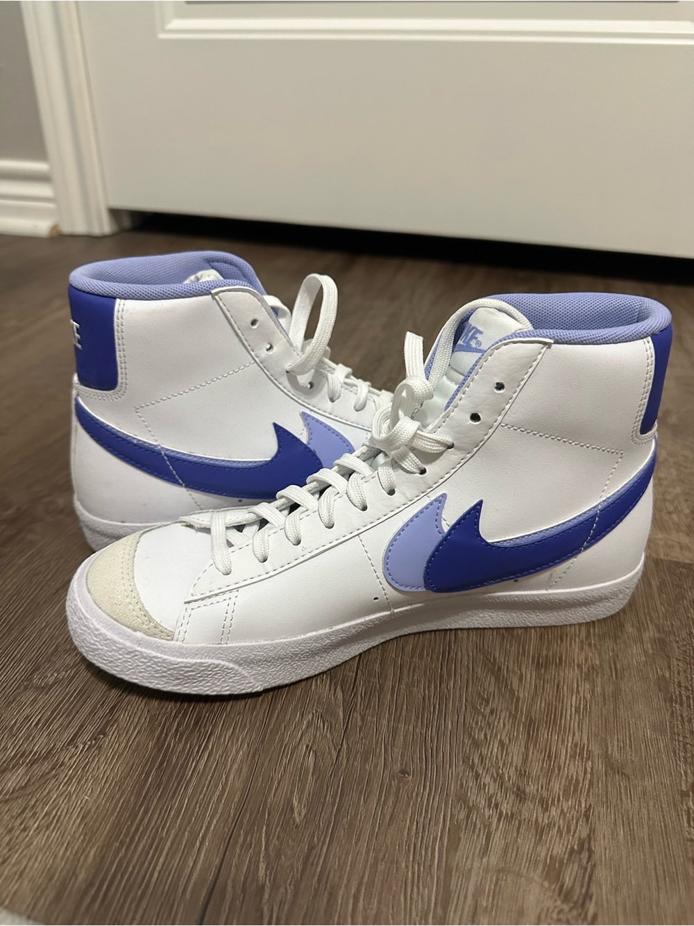 Nike Women’s White High-Top Sneakers with Purple & Lavender Swoosh